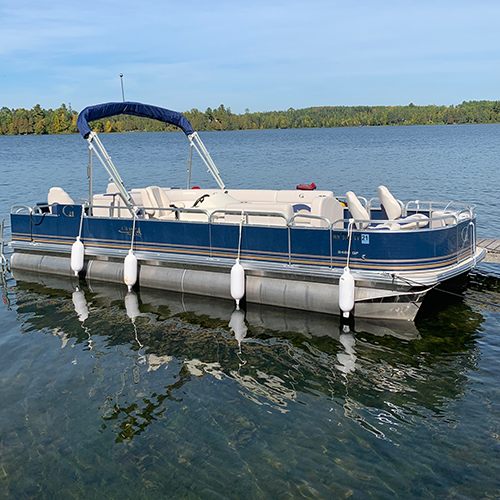 24' Pontoon docked at Cedar Point resort that is availavble for rent.